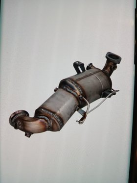 Replacement diesel particulate filter and exhaust assembly